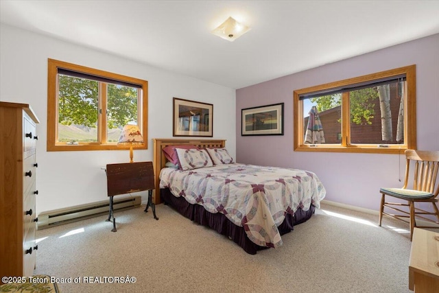 3470 S Winding Trail Dr, Jackson, WY 83001 - carpeted bedroom with baseboard heating and baseboards