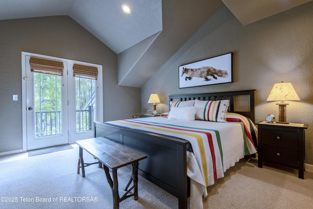 125 Cobble Creek Ln Unit 75, Driggs, ID 83422 - bedroom featuring access to outside, carpet, lofted ceiling, a textured wall, and baseboards
