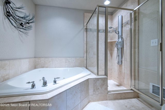125 Cobble Creek Ln Unit 75, Driggs, ID 83422 - full bathroom with a whirlpool tub and a shower stall