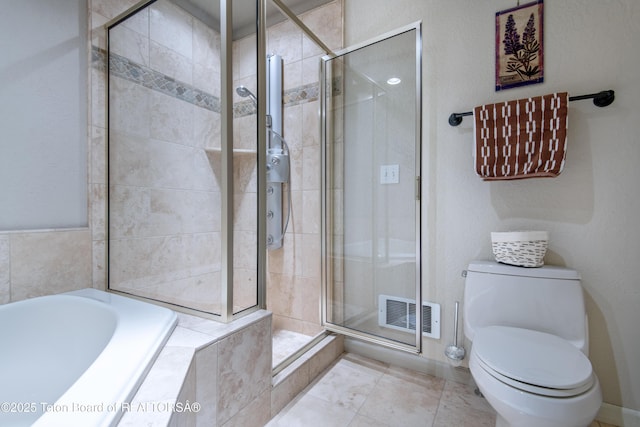 125 Cobble Creek Ln Unit 75, Driggs, ID 83422 - full bathroom with a garden tub, a stall shower, and toilet