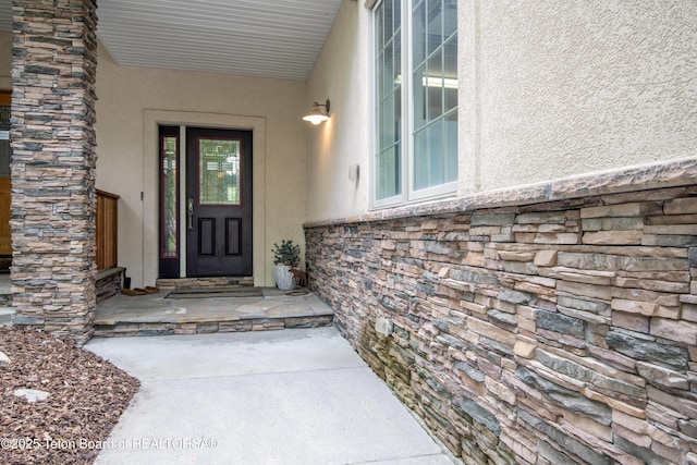 125 Cobble Creek Ln Unit 75, Driggs, ID 83422 - entrance to property featuring stucco siding and stone siding