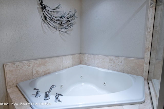 125 Cobble Creek Ln Unit 75, Driggs, ID 83422 - bathroom with a tub with jets