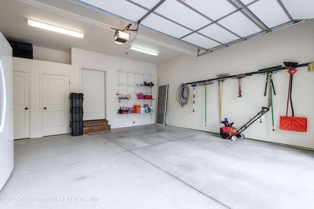 125 Cobble Creek Ln Unit 75, Driggs, ID 83422 - garage with a garage door opener