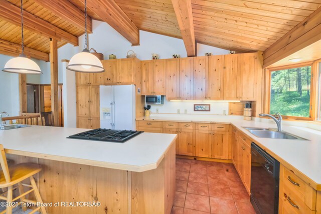 3190 Sorensen Creek Dr, Victor, ID 83455 - kitchen featuring black appliances, a sink, light brown cabinets, light countertops, and wood ceiling