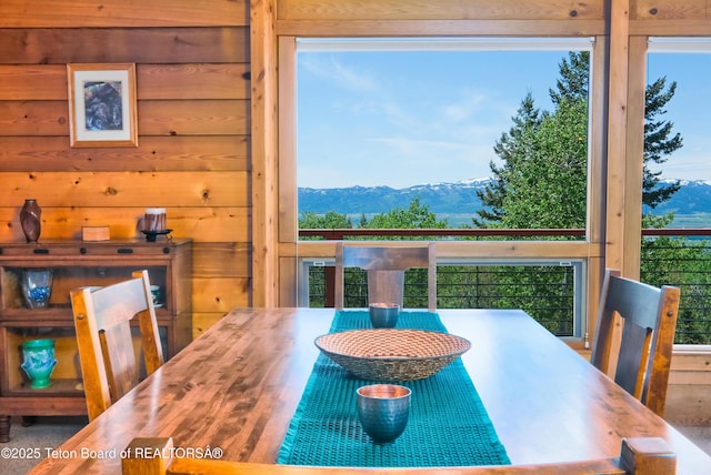 3190 Sorensen Creek Dr, Victor, ID 83455 - dining area featuring a mountain view and wood walls