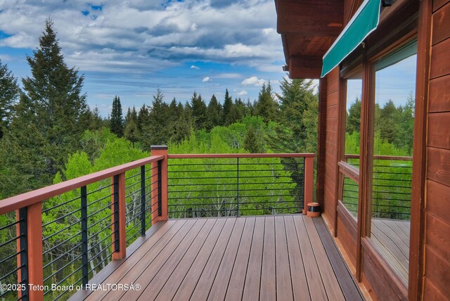 3190 Sorensen Creek Dr, Victor, ID 83455 - wooden terrace featuring a forest view