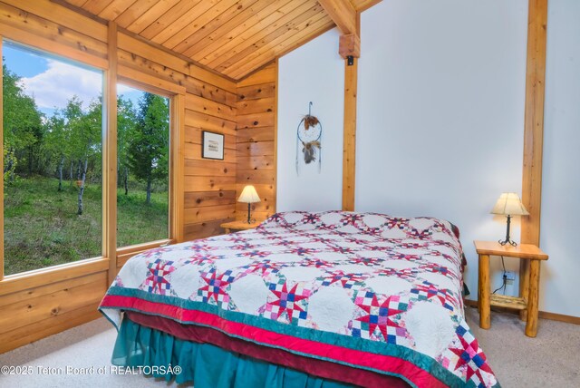 3190 Sorensen Creek Dr, Victor, ID 83455 - bedroom with wood ceiling, vaulted ceiling, carpet floors, and wooden walls