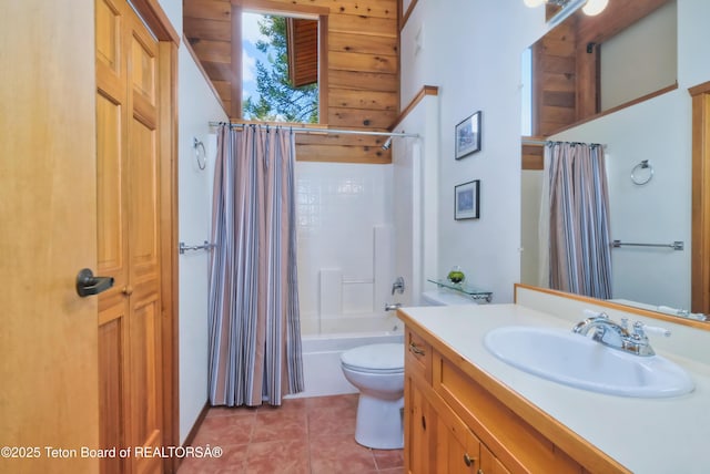 3190 Sorensen Creek Dr, Victor, ID 83455 - bathroom featuring vanity, toilet, shower / bath combination with curtain, and tile patterned floors