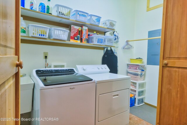 3190 Sorensen Creek Dr, Victor, ID 83455 - washroom featuring washing machine and dryer and electric panel