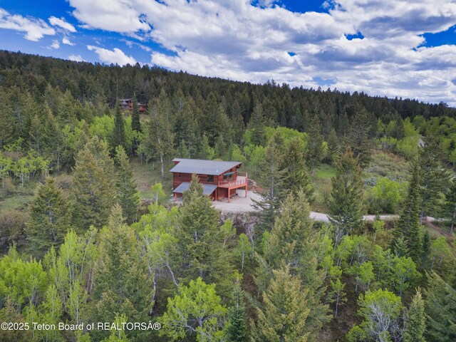 3190 Sorensen Creek Dr, Victor, ID 83455 - view from above of property featuring a heavily wooded area