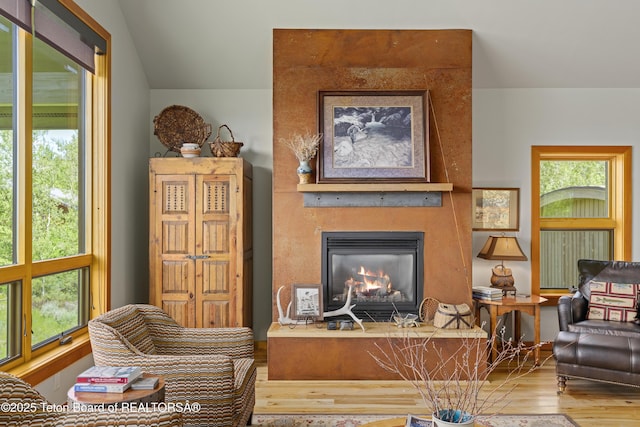 25000 N Deer Ct, Moran, WY 83013 - living area with wood finished floors and a large fireplace