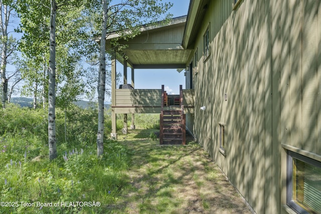 25000 N Deer Ct, Moran, WY 83013 - view of yard featuring stairs and a wooden deck