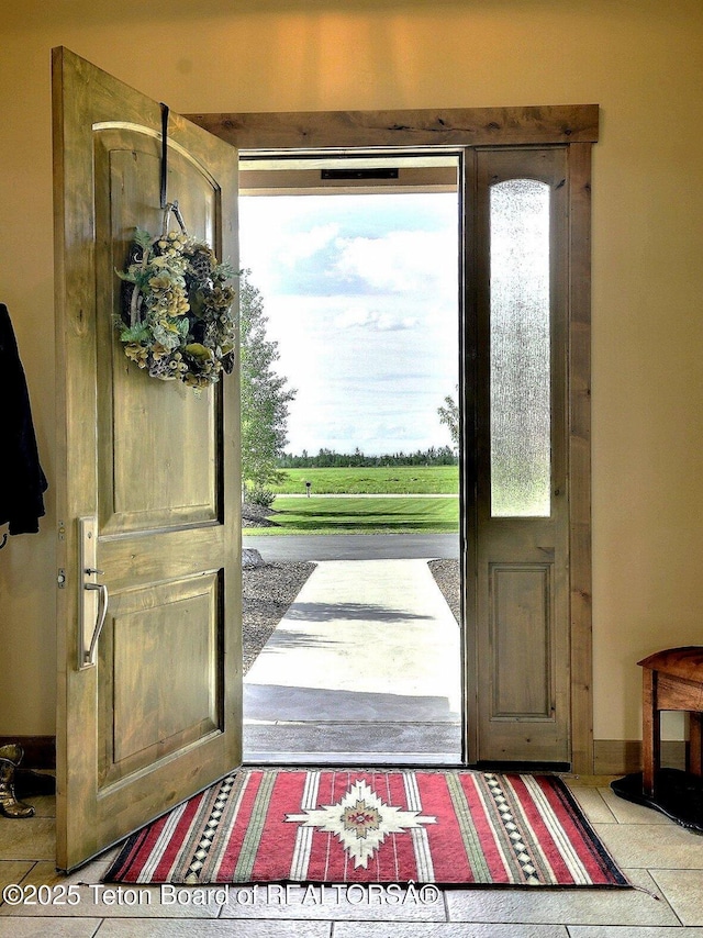 1795 Fumarole Dr, Victor, ID 83455 - entryway featuring baseboards