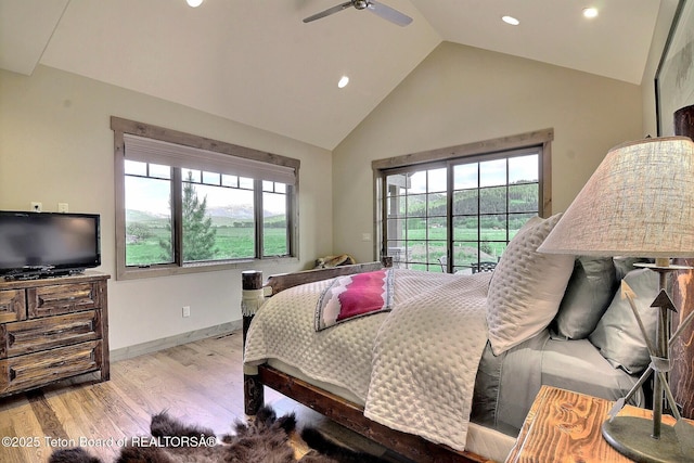 1795 Fumarole Dr, Victor, ID 83455 - bedroom featuring wood finished floors, recessed lighting, high vaulted ceiling, access to exterior, and a ceiling fan