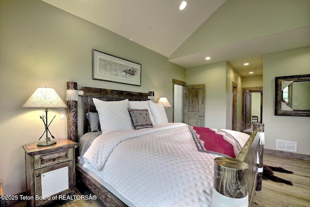 1795 Fumarole Dr, Victor, ID 83455 - bedroom with wood finished floors, recessed lighting, and vaulted ceiling