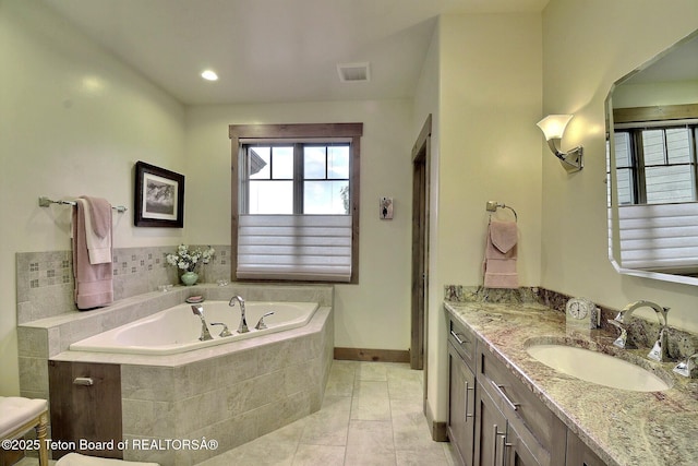 1795 Fumarole Dr, Victor, ID 83455 - full bathroom featuring a bath, vanity, and tile patterned flooring