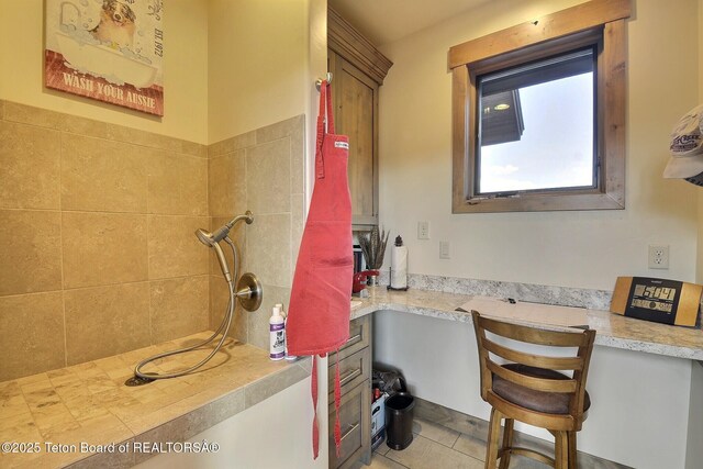 1795 Fumarole Dr, Victor, ID 83455 - bathroom with tiled shower and tile patterned flooring