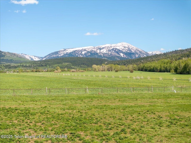 1795 Fumarole Dr, Victor, ID 83455 - view of mountain backdrop featuring rural landscape and a pastoral area