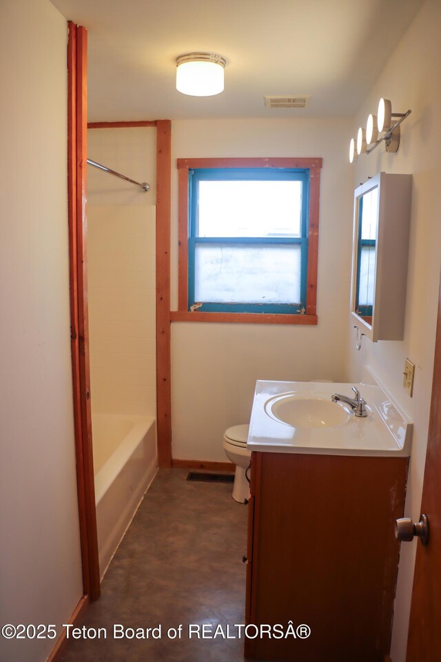 510 Rakestraw Ave, Marbleton, WY 83113 - bathroom featuring vanity, toilet, and baseboards