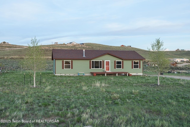 58 Blackhawk Trl, Boulder, WY 82923 - ranch-style home with a front lawn