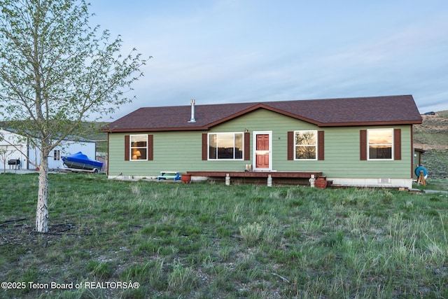 58 Blackhawk Trl, Boulder, WY 82923 - view of front of house with roof with shingles and a front lawn