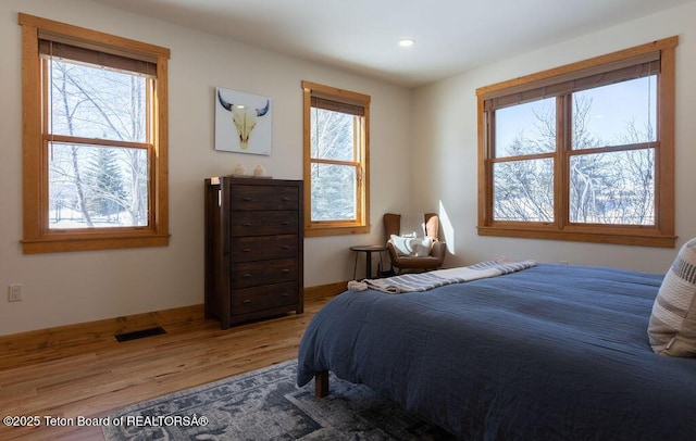 4370 Balsam Ln, Jackson, WY 83001 - bedroom featuring light wood finished floors and recessed lighting