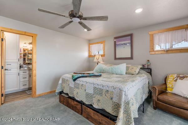 1516 Fischer Ln, Tetonia, ID 83452 - bedroom featuring light carpet, recessed lighting, baseboards, and a ceiling fan