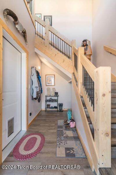 1516 Fischer Ln, Tetonia, ID 83452 - stairs with wood finished floors and a towering ceiling