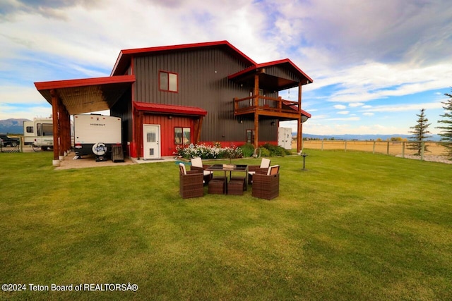 1516 Fischer Ln, Tetonia, ID 83452 - rear view of property featuring board and batten siding