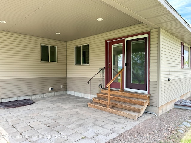 210 E 8th Ave, Afton, WY 83110 - view of exterior entry with a patio