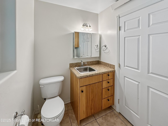 210 E 8th Ave, Afton, WY 83110 - half bathroom featuring toilet, vanity, and tile patterned floors