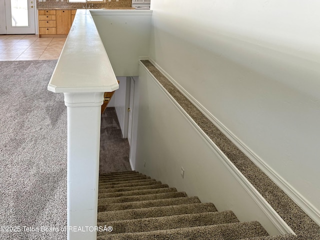 210 E 8th Ave, Afton, WY 83110 - stairs with carpet floors and tile patterned floors