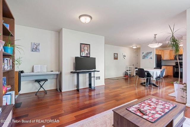 7552 Mountain Laurel Dr Unit D-3, Victor, ID 83455 - living room with wood finished floors and baseboards