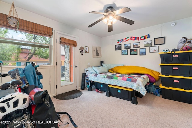 7552 Mountain Laurel Dr Unit D-3, Victor, ID 83455 - bedroom with carpet flooring, access to outside, and a ceiling fan