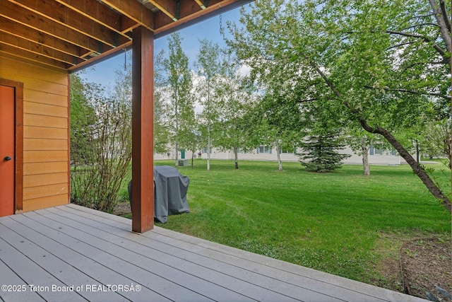 7552 Mountain Laurel Dr Unit D-3, Victor, ID 83455 - wooden deck featuring a lawn