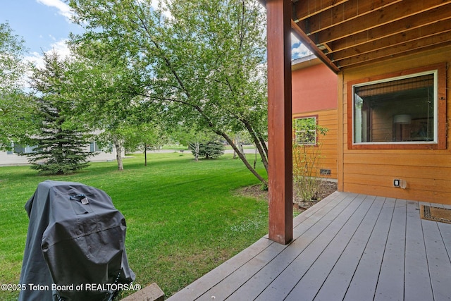 7552 Mountain Laurel Dr Unit D-3, Victor, ID 83455 - wooden terrace featuring a grill and a lawn