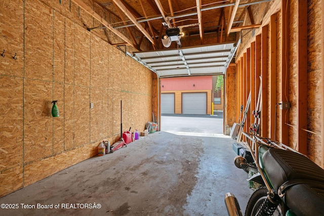 7552 Mountain Laurel Dr Unit D-3, Victor, ID 83455 - garage featuring a garage door opener