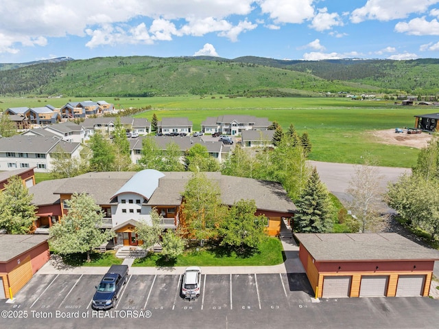 7552 Mountain Laurel Dr Unit D-3, Victor, ID 83455 - aerial perspective of suburban area with a mountainous background