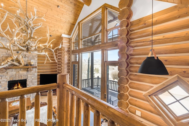 29 Bannock Cir, Victor, ID 83455 - hall featuring rustic walls, high vaulted ceiling, and wood ceiling with exposed beams