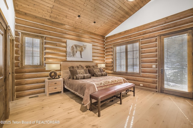 29 Bannock Cir, Victor, ID 83455 - bedroom with rustic walls, hardwood / wood-style floors, high vaulted ceiling, wood ceiling, and access to exterior