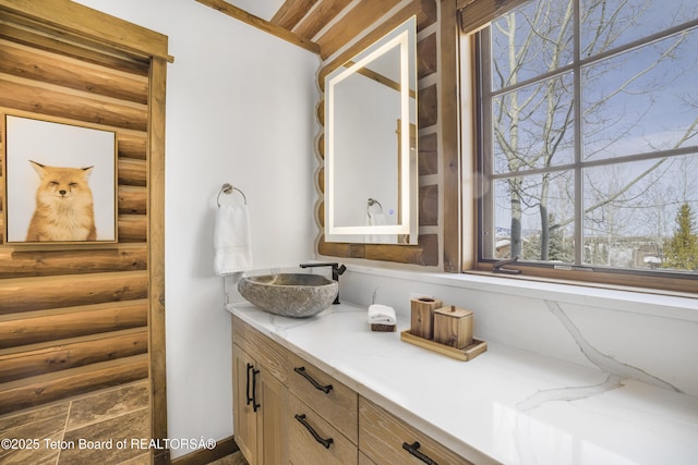 29 Bannock Cir, Victor, ID 83455 - bathroom with rustic walls and vanity