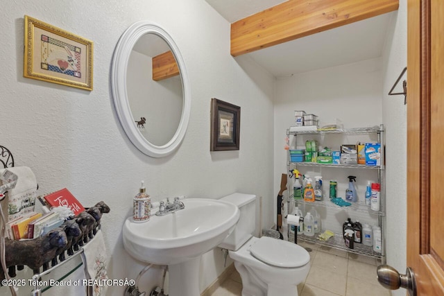 205 Betsy Ct, Bedford, WY 83112 - half bathroom featuring tile patterned floors and toilet