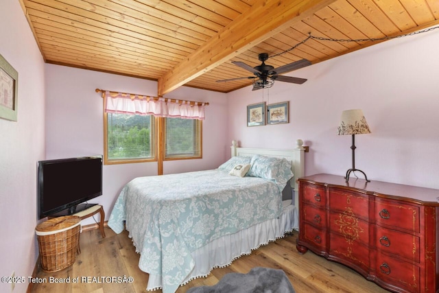 205 Betsy Ct, Bedford, WY 83112 - bedroom with wood ceiling with exposed beams, wood finished floors, and ceiling fan