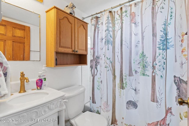 205 Betsy Ct, Bedford, WY 83112 - bathroom featuring vanity, toilet, and a shower with curtain