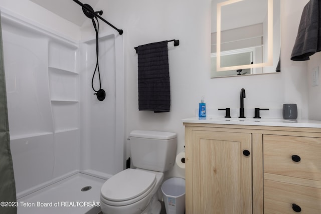 6118 Hatfield Way, Driggs, ID 83422 - full bathroom with vanity, a shower, and toilet