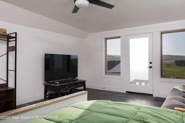 6118 Hatfield Way, Driggs, ID 83422 - bedroom featuring baseboards, wood finished floors, vaulted ceiling, and a ceiling fan