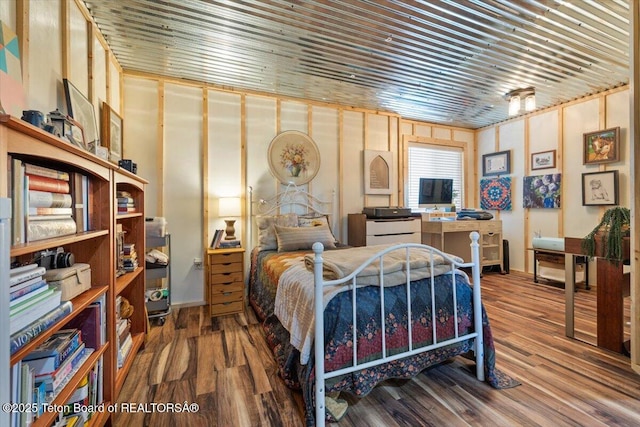 62 Skyline Dr, Bondurant, WY 82922 - bedroom featuring wood finished floors and baseboards