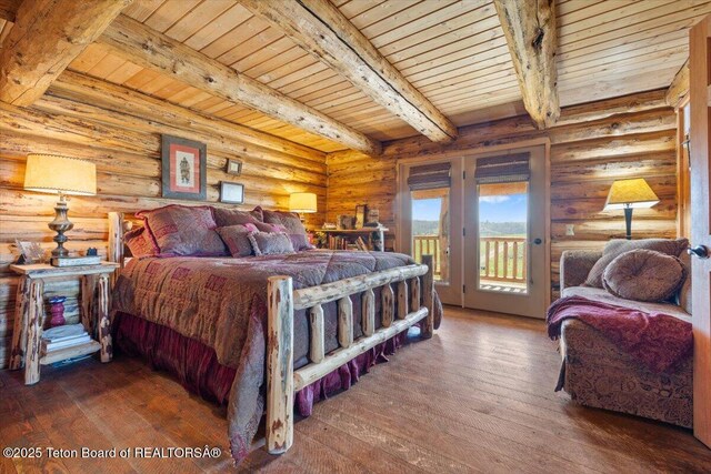 62 Skyline Dr, Bondurant, WY 82922 - bedroom with access to exterior, wooden ceiling with exposed beams, hardwood / wood-style flooring, and rustic walls