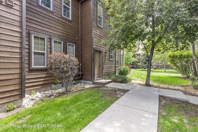 715 Moraine Ct Unit 36, Driggs, ID 83422 - entrance to property featuring a yard