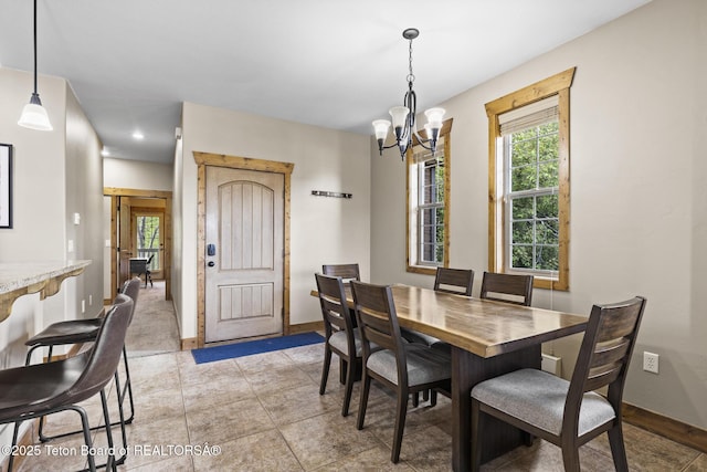 715 Moraine Ct Unit 36, Driggs, ID 83422 - dining area featuring a chandelier, plenty of natural light, and recessed lighting